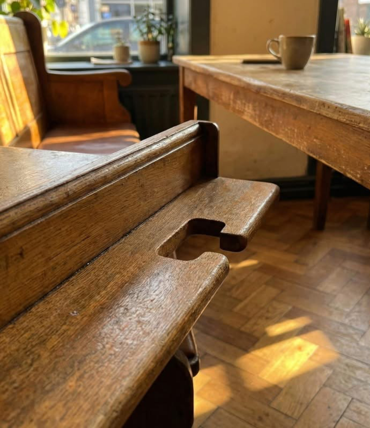 Every pew in this Catholic cathedral has these cut-out slots. Does anyone know what they’re used for? Read more in the comments…👇