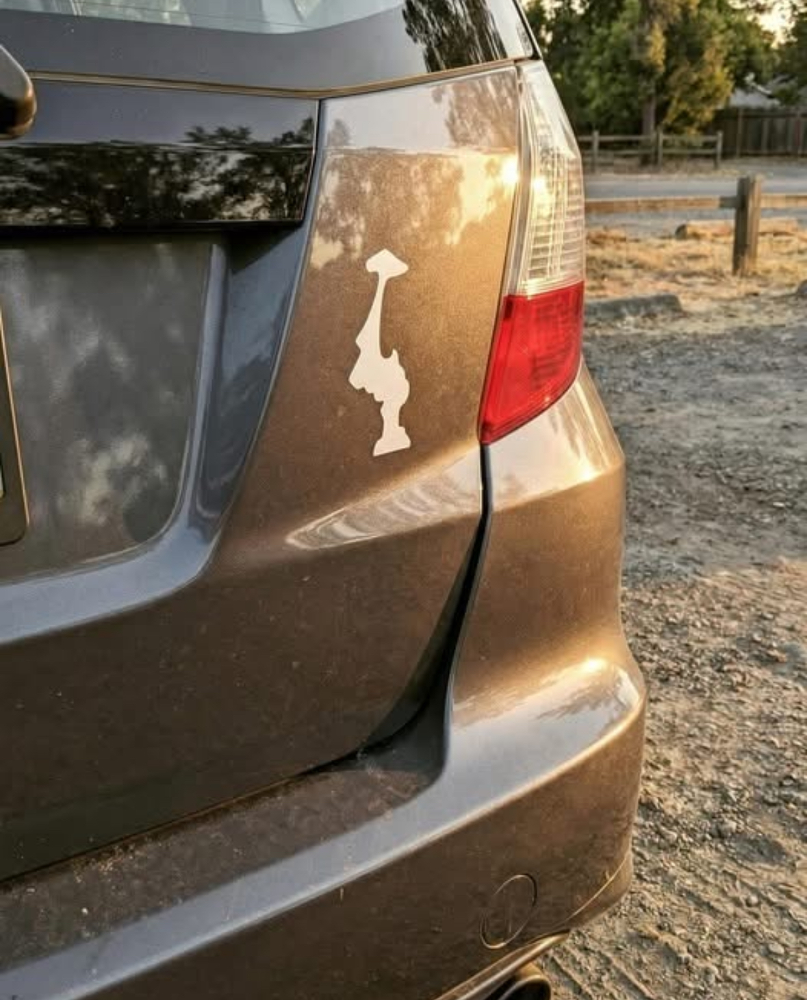 My grandpa saw this sticker and took a pic. What is it?? 🤯🤯 He wants to know.⤵️