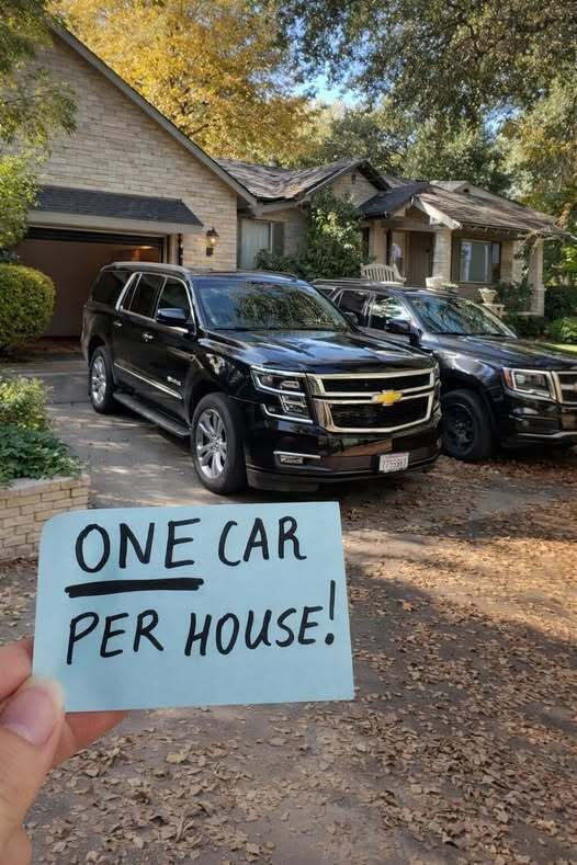 Our neighbor put a note on our car: “One car per house!” Soon afterward, she came over herself. I opened the door to greet her. She was in a pastel pink cardigan, a matching headband, and white capri pants. “Our HOA—very friendly, but firm—has rules: only one car per household in the driveway,” she stated. I blinked. “One car?” “Yes,” she answered more sternly. “No exceptions. It keeps us all orderly.” Jack looked at her. “Both our cars fit on the driveway, we’re not on the street.” “Still, two cars isn’t allowed. One house, one driveway, one car. The rule is for everyone,” she said with a tilt of her head. She left. We ignored her warning. Three days later, both of our cars had been towed. She stood outside, smiling widely. ME: “Wow! You really did it!” HER: “What’s so funny?!” ME: “Nothing. Just that YOU OWE US $25,000 NOW.” HER: nervous gulp “What—What do you mean?” I pointed at the mark on the tag, laughing. “Bet you overlooked that symbol!”👇