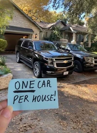 Our neighbor put a note on our car: “One car per house!” Soon afterward, she came over herself. I opened the door to greet her. She was in a pastel pink cardigan, a matching headband, and white capri pants. “Our HOA—very friendly, but firm—has rules: only one car per household in the driveway,” she stated. I blinked. “One car?” “Yes,” she answered more sternly. “No exceptions. It keeps us all orderly.” Jack looked at her. “Both our cars fit on the driveway, we’re not on the street.” “Still, two cars isn’t allowed. One house, one driveway, one car. The rule is for everyone,” she said with a tilt of her head. She left. We ignored her warning. Three days later, both of our cars had been towed. She stood outside, smiling widely. ME: “Wow! You really did it!” HER: “What’s so funny?!” ME: “Nothing. Just that YOU OWE US $25,000 NOW.” HER: *nervous gulp* “What—What do you mean?” I pointed at the mark on the tag, laughing. “Bet you overlooked that symbol!”👇 See less